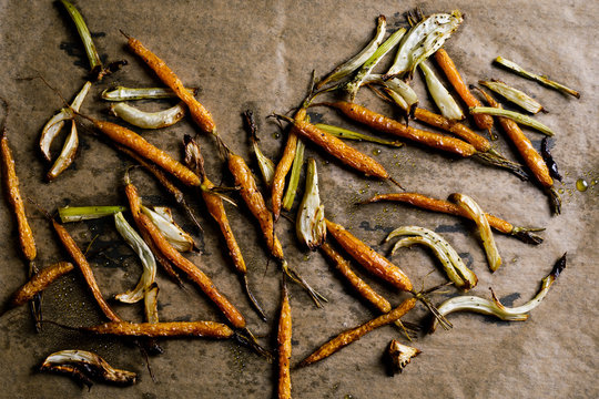 Close up of roasted vegetables on parchment paper
