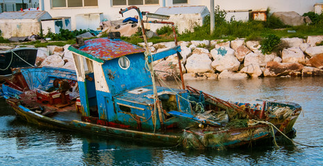 Fototapeta na wymiar abandon fishing boat Lagos