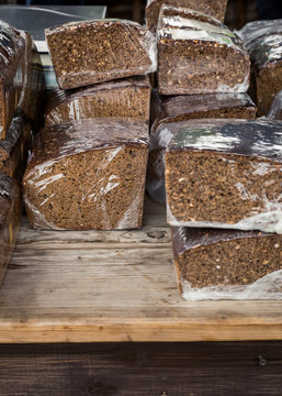 Close up of stack of rye breads on table