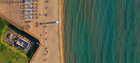 Aerial drone ultra wide top down photo of famous sandy beach of Asteras or Astir in Vouliagmeni,...