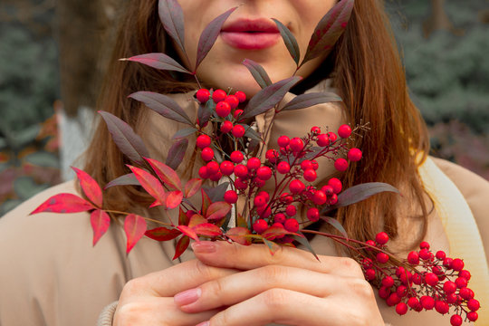 Young Woman With Red Flowers