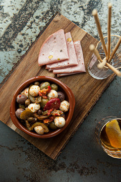 Antipasto board with meat, olives, cheese