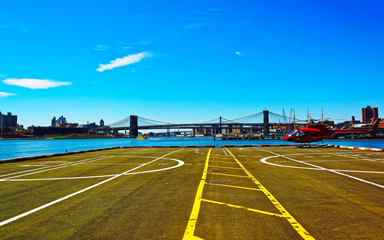 Fototapeta na wymiar Helicopter landing at helipad. Skyline with Skyscrapers in Lower Manhattan, New York City, America USA. American architecture building. Metropolis NYC. Cityscape. Hudson, East River NY