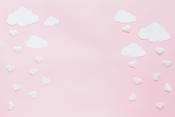 Festive flat lay. Foil heart shaped balloons on a pastel pink background. The concept of love Holiday Valentine's Day or wedding, bachelorette party, birthday.