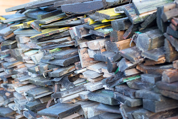 Stack of wooden boards from the dismantled house