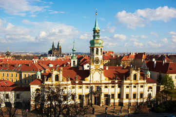 Obraz premium Loreta is a pilgrimage destination in Hradcany, a district of Prague, Czech Republic. Saint Vitus Cathedral background. Selective Focus
