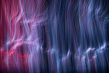 defocused luminous colored stripes, abstract chaotic interlacing of lines