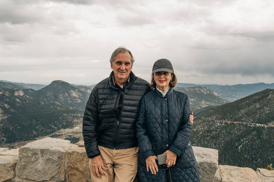 An Older Couple Enjoy A Hike In Rocky Mountain National Park, Colorado