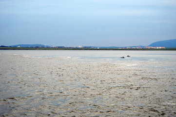  Boats with fishermen in the Anadyr estuary near the city of Anadyr