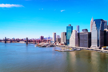 Obraz premium Aerial panoramic view on Skyline with Skyscrapers in Downtown and Lower Manhattan, New York City, America USA. American architecture building. Panorama of Metropolis NYC. Cityscape. Hudson, East River