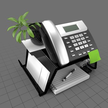 Mesh phone stand with office items