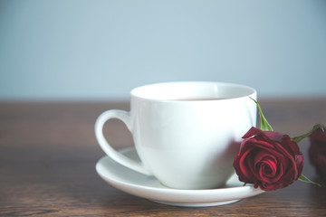 red rose and cup of coffee