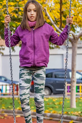 Little girl posing in park