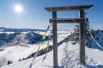 Winterlandscape in the Allgaeu Mountains, view from Hochgrat summit over a sea of fog to the...