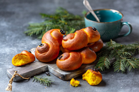 Homemade Swedish buns with saffron and raisins.