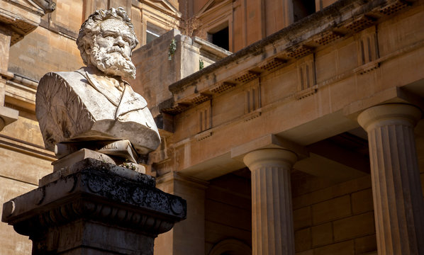 The bust of Giosue Carducci in front of the Convitto Palmieri library on the Piazzetta Carducci in Lecce Puglia Italy