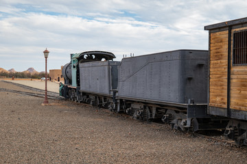 Train and carriages on the Hijaz Railway line at Mada'in Saleh (Hegra), Al Ula, Saudi Arabia 