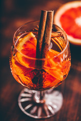 Glass of orange whiskey sour cocktail