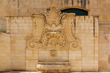 Naklejka premium Sculpture of saint on the facade, Malta