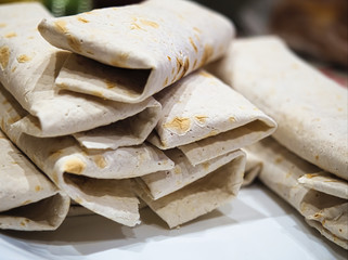 Fresh homemade stuffed wrap sandwiches (shawerma, burritos) closeup