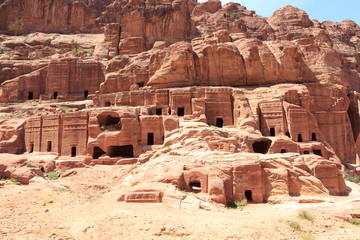 Caves at street of facades in ancient city of Petra in Jordan