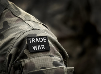 trade war concept. inscription trade war on military uniform.