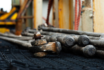 Photo of lashing bar for container securing on deck of Container ship.