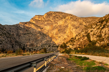 Great mountain under the sun, with aqueduct and road