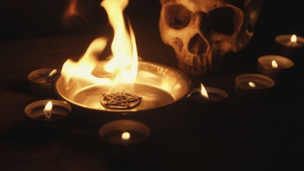 Burning pentacle on altar closeup photo