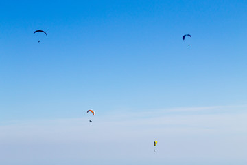 Paraglider on blue sky, Borso del Grappa, Italy