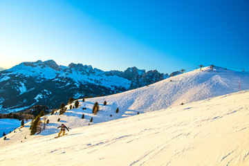 Dolomites ski slope in winter, Vigo di Fassa area