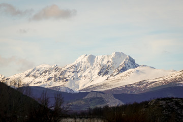 Obraz na płótnie Canvas Views of the curavacas peak with snow, Palencia mountain. Spain