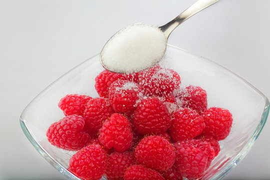 aspberries in a glass bowl