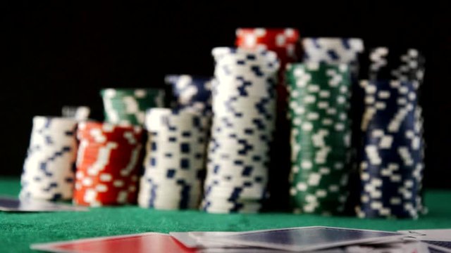 Cards Fall with Casino Chips in Slow Motion