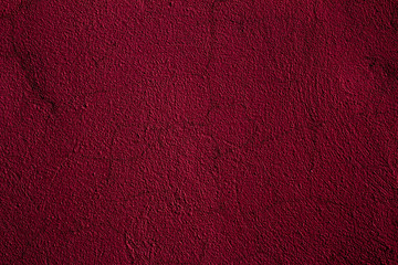 Abstract textured background in crimson