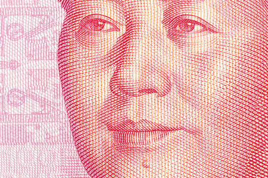 Close Up Face Detail Of Mao On The Chinese 100 Yuan Currency Note.  