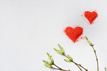 Valentine's day background. Heart made of red crumbs on a white background. top view. Copy space. Flat lay. Greeting card.