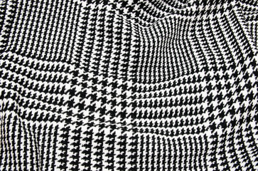 Black and white cage fabric or cloth textile.