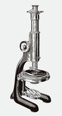 Non-inclinable optical microscope with revolving stage for mineralogical research. Illustration after a historical engraving from the 19th century