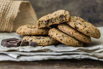 Freshly Baked Chocolate Cookies on Baking Paper. Sweet Biscuits. Homemade pastry.