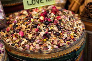 Mixed herbal tea being sold in front of store.