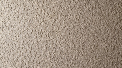 Beige wallpaper made of PVC with a convex ornament