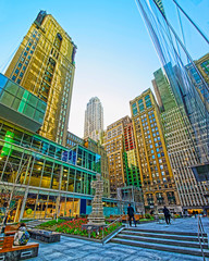 Street in Financial District at Lower and Downtown Manhattan, New York of USA. Skyline and...