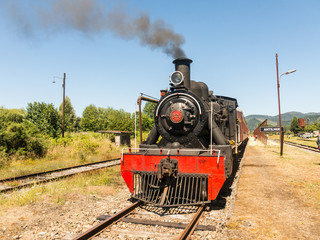 Tourist train called Valdiviano that runs from Valdivia to Antilhue with a 1913 North British locomotive type 57. Los Rios Region, in southern Chile.