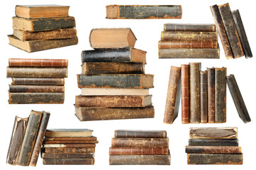Isolated old books. Collection of old books in piles and stacks isolated on white background with clipping path