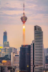 Poster KUALA LUMPUR, MALAYSIA - FEBRUARY 19, 2018:.The Menara Kuala Lumpur Tower illuminated at night. Builted in 1995, is the 7th tallest communication tower in the world. © Luciano Mortula-LGM