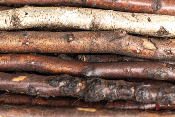 Chopped firewood logs in rows. Wood texture