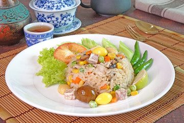 Eight immortals fried rice (or Baxian rice), Fragrance fried rice with chestnut, ginkgo biloba, mushroom, lotus seeds, sweet pea, taro, carrot and corns. Vegetarian food for vegetarian festival.