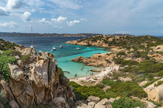 The view on beautiful Cala Napoletana. Beaches of Caprera Island in The Maddalena Archipelago. Transparent turquoise water in Sardinia, Italy