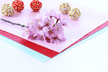 桜の花と和紙と水引玉